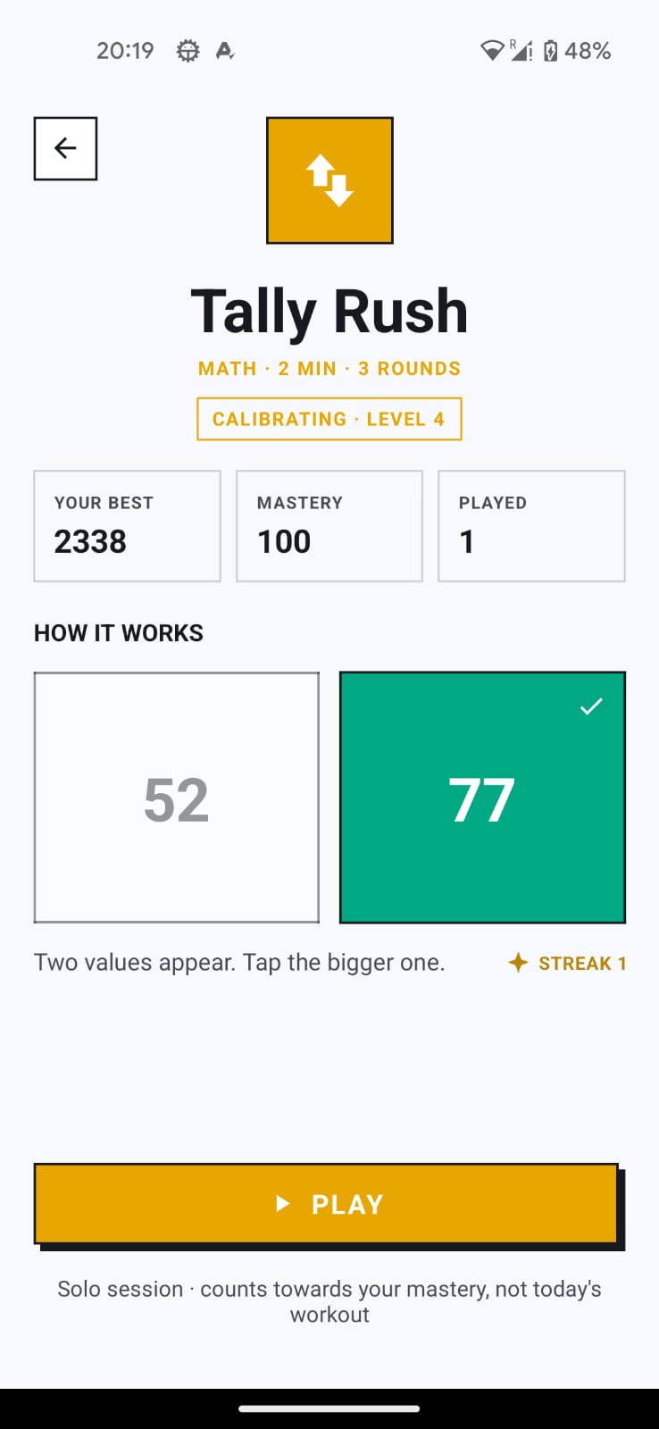 Tally Rush game screen showing two values, 52 and 77, to compare